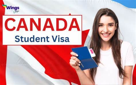 A woman holding her passport in front of the canadian flag.